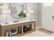 Welcoming entryway featuring console table with decor and a decorative mirror at 13271 Pergola Ave, Orlando, FL 32832
