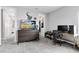 Bedroom with neutral walls and gray carpet and featuring a walk in closet at 13807 Tybee Beach Ln, Orlando, FL 32827