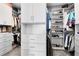 Organized walk-in closet with custom shelving, drawers, and ample storage space at 13807 Tybee Beach Ln, Orlando, FL 32827