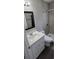 Bathroom with quartz vanity and wood look floors at 159 Piccolo Way, Davenport, FL 33896