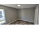 Bedroom featuring wood-look floors and neutral walls at 159 Piccolo Way, Davenport, FL 33896