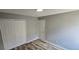 Bedroom featuring wood-look floors and neutral walls at 159 Piccolo Way, Davenport, FL 33896