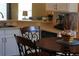 Breakfast nook featuring table, chairs and a view to the living room at 15910 Mercott Ct, Clermont, FL 34714