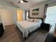 Spacious Primary bedroom with plenty of natural light and an en-suite bathroom at 15910 Mercott Ct, Clermont, FL 34714