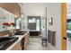 Luxurious bathroom featuring dual sinks, elegant lighting, and a soaking tub for a spa-like experience at 1624 E Livingston St, Orlando, FL 32803