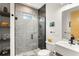 Modern bathroom with glass shower, unique tile, and sleek fixtures at 1624 E Livingston St, Orlando, FL 32803