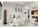 Modern dining room featuring stylish decor, contemporary lighting, and marble flooring at 1624 E Livingston St, Orlando, FL 32803