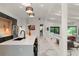 Bright, open kitchen featuring a spacious island with seating and marble flooring at 1624 E Livingston St, Orlando, FL 32803