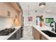 Well-lit kitchen with modern appliances, stylish cabinets, and a breakfast nook at 1624 E Livingston St, Orlando, FL 32803