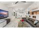 Spacious living room with vaulted ceilings, stylish furnishings, and an open-concept design at 1624 E Livingston St, Orlando, FL 32803