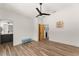 Spacious main bedroom with wood floors, en-suite bathroom, and modern decor at 1624 E Livingston St, Orlando, FL 32803