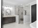 Modern bathroom featuring updated tile and glass enclosed shower with dual shower heads at 1840 Bryan Ave, Winter Park, FL 32789