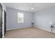 Bedroom featuring neutral carpet, light blue walls and a ceiling fan at 1840 Bryan Ave, Winter Park, FL 32789