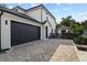 Spacious two-car garage with a paved driveway at 1840 Bryan Ave, Winter Park, FL 32789