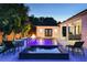 Inviting pool area with spa and multiple water features and lights at 1840 Bryan Ave, Winter Park, FL 32789