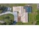 Areal shot from directly above highlighting the pool and unique roofline at 20 Lido Rd, Winter Springs, FL 32708