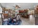 Open-concept living space with a dining area and kitchen, perfect for Gathering gatherings at 20 Lido Rd, Winter Springs, FL 32708
