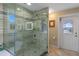 Large glass shower includes light feature, decorative tile, and multiple shower heads at 20 Lido Rd, Winter Springs, FL 32708