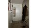 Damaged bathroom needs remodeling and features exposed drywall, missing floor, and wall damage at 2115 Messina Ave, Orlando, FL 32811