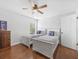 Charming bedroom with two twin beds, a ceiling fan, and ample natural light at 226 Ringwood Dr, Winter Springs, FL 32708