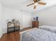 Bright bedroom featuring two twin beds, hardwood floors, and closet space at 226 Ringwood Dr, Winter Springs, FL 32708