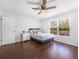 Bedroom featuring hardwood floors, a ceiling fan, and bright natural light at 226 Ringwood Dr, Winter Springs, FL 32708