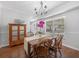 Inviting dining room featuring a wood table set and natural light from large windows at 226 Ringwood Dr, Winter Springs, FL 32708