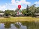 Charming property featuring a waterfront view and screened-in lanai at 226 Ringwood Dr, Winter Springs, FL 32708