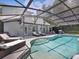 Sparkling screened-in pool with spacious patio area, perfect for outdoor relaxation and entertaining at 226 Ringwood Dr, Winter Springs, FL 32708