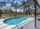 Sparkling screened-in pool with spacious patio area, perfect for outdoor relaxation and entertaining at 226 Ringwood Dr, Winter Springs, FL 32708