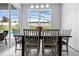 Cozy dining area with view to the pool, perfect for enjoying meals with a view at 2263 Wyndham Palms Way, Kissimmee, FL 34747