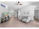 Spacious living room featuring modern decor, wood floors, and ample natural light at 2263 Wyndham Palms Way, Kissimmee, FL 34747