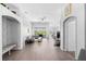 Expansive living room area showcases a neutral color palette and open access to other living spaces at 2263 Wyndham Palms Way, Kissimmee, FL 34747