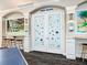 Entrance to private movie theater with fun, retro decor and arcade-themed design elements at 2263 Wyndham Palms Way, Kissimmee, FL 34747
