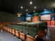 Cozy movie theater with tiered seating, perfect for enjoying films with friends and Gathering at 2263 Wyndham Palms Way, Kissimmee, FL 34747