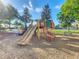 Community playground with slides and climbing structures, perfect for active outdoor fun at 2263 Wyndham Palms Way, Kissimmee, FL 34747