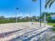 A sand volleyball court providing a great space for outdoor activities and friendly competition at 2263 Wyndham Palms Way, Kissimmee, FL 34747