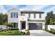 Beautiful two-story home featuring a modern design with brick and stucco accents at 2612 Musselwhite Ave, Orlando, FL 32804