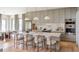 Elegant kitchen with marble countertops, pendant lighting, and stainless steel appliances at 2612 Musselwhite Ave, Orlando, FL 32804