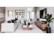 Bright living room with white sofa, built-in shelves, and modern decor at 2612 Musselwhite Ave, Orlando, FL 32804