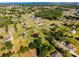 This aerial view highlights the property's location with easy access to local roads in a desirable neighborhood at 2726 La Alameda Ave, Kissimmee, FL 34746