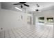 Spacious living room featuring tiled floors, recessed lighting, and natural light at 2726 La Alameda Ave, Kissimmee, FL 34746