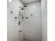 Tiled stand up shower with adjustable head and glass shelf at 2726 La Alameda Ave, Kissimmee, FL 34746