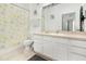 Bright bathroom with white vanity, decorative shower curtain and clean finishes at 2785 Almaton Loop # 202, Kissimmee, FL 34747
