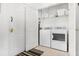 Convenient laundry area with modern washer and dryer units and ample storage space at 2785 Almaton Loop # 202, Kissimmee, FL 34747