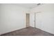 Bedroom with neutral carpet and large closet with sliding doors at 3128 Oxbow Ct, Harmony, FL 34773