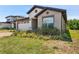 Attractive single-story home boasting a brick driveway, a two-car garage, and mature landscaping at 3128 Oxbow Ct, Harmony, FL 34773