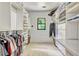 Large walk-in closet with custom shelving, racks and organizers for optimal storage solutions and convenience at 3359 Scarlet Dr, Sanford, FL 32773