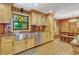 Well-lit kitchen featuring stainless steel appliances and a view to the dining area at 3359 Scarlet Dr, Sanford, FL 32773