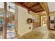 Living room featuring a unique fireplace and an open doorway to the bedroom at 3359 Scarlet Dr, Sanford, FL 32773